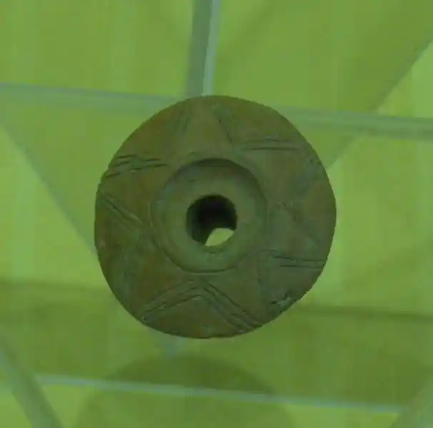 Six-pointed star with a hole in the center carved on clay found in Ephesus, Izmir.